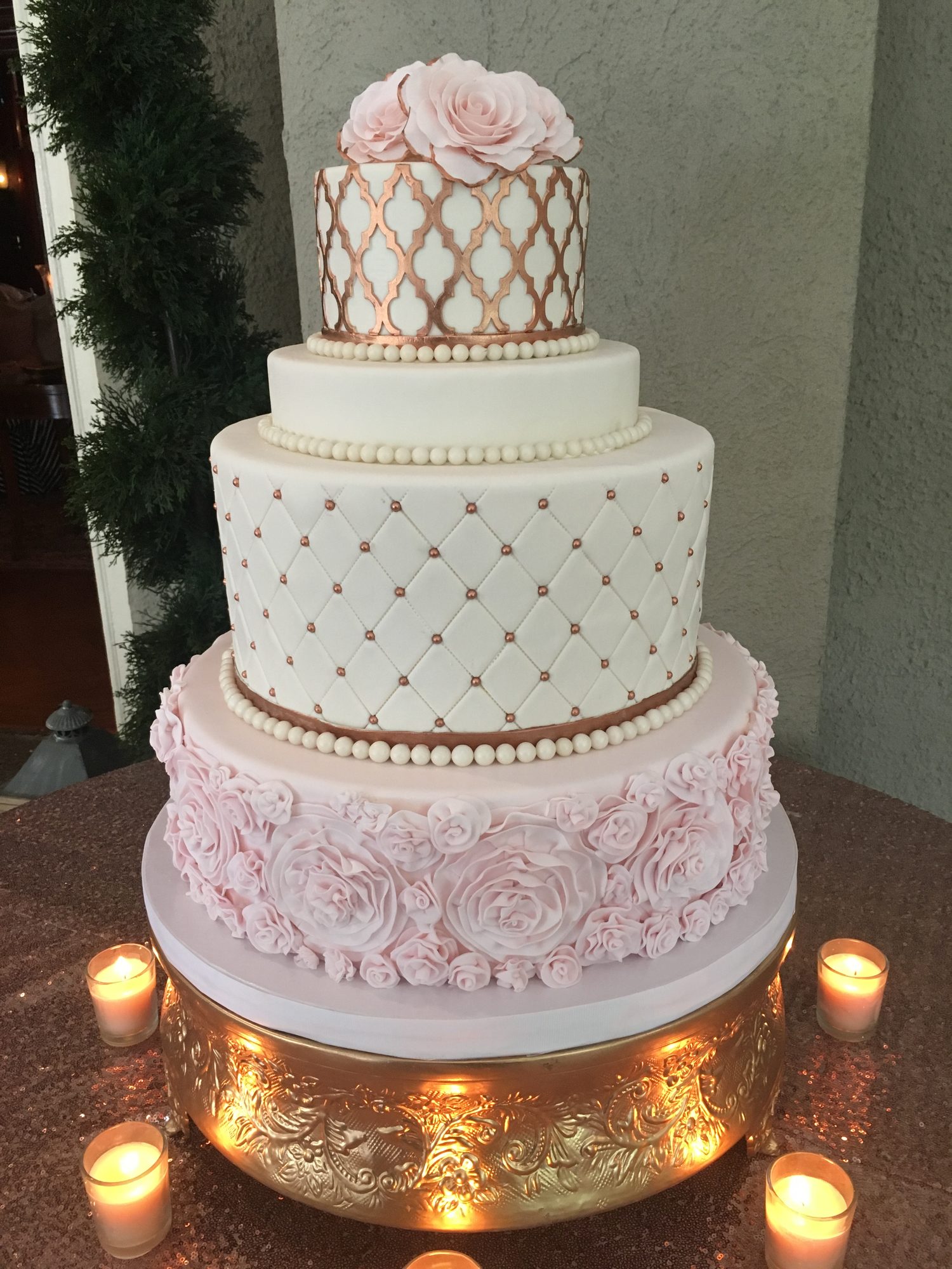 Rose gold quilted wedding cake with sugar roses